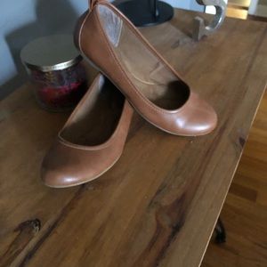 Brown leather flats